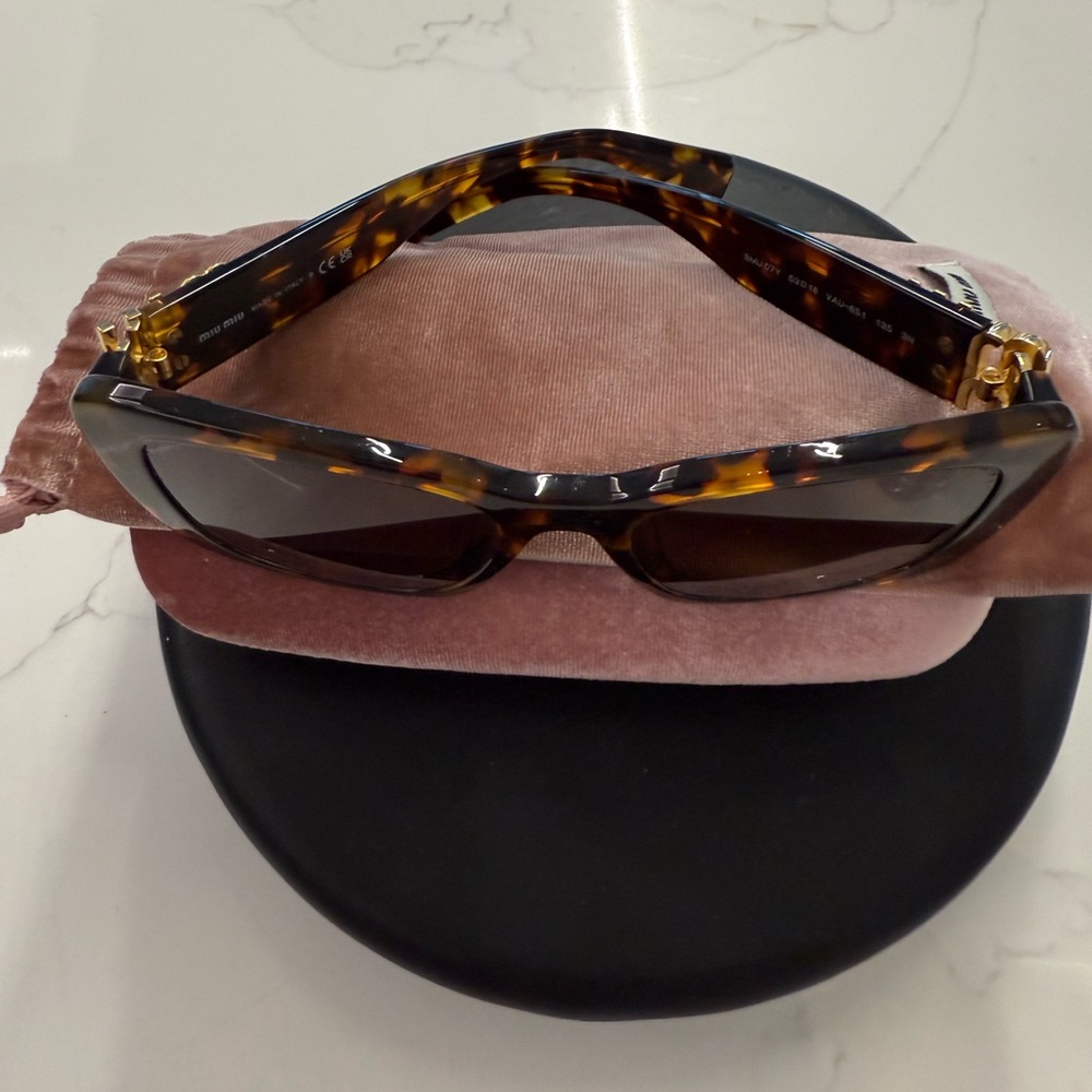 Miu Miu Tortoiseshell Rectangular Sunglasses with Dark Lenses